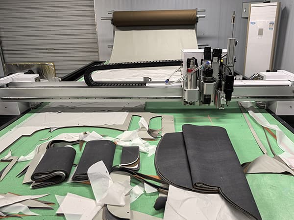 How many sofa sets can a cnc fabric cutting machine produce in one day